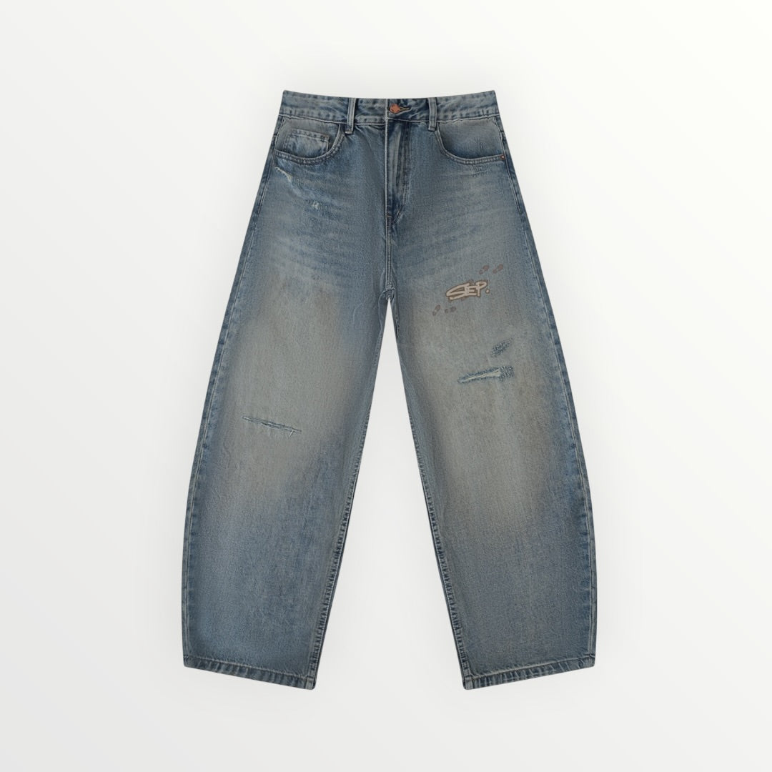 STEP DISTRESSED JEANS